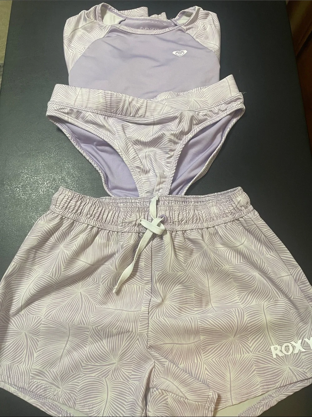 Roxy Girls' Lavender Swim Bottoms and Shorts Set 3 pieces used/good Sz.M 10/12